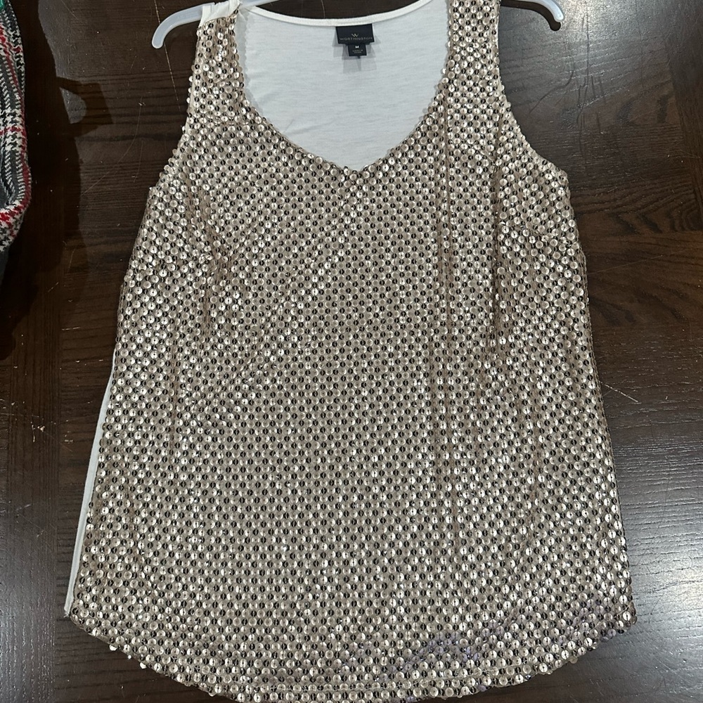 Sassy gold sparkle sleeveless shirt. Size medium. Like new.